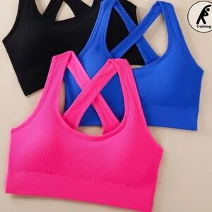 (2) blue and pink sports bras